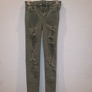 distressed green jeans